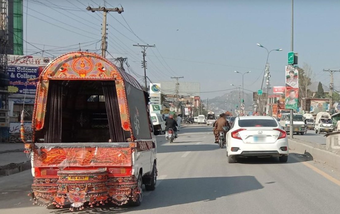 Paratransit and collective transport vehicle on Abbottabad's main road, the Karakorum Highway.