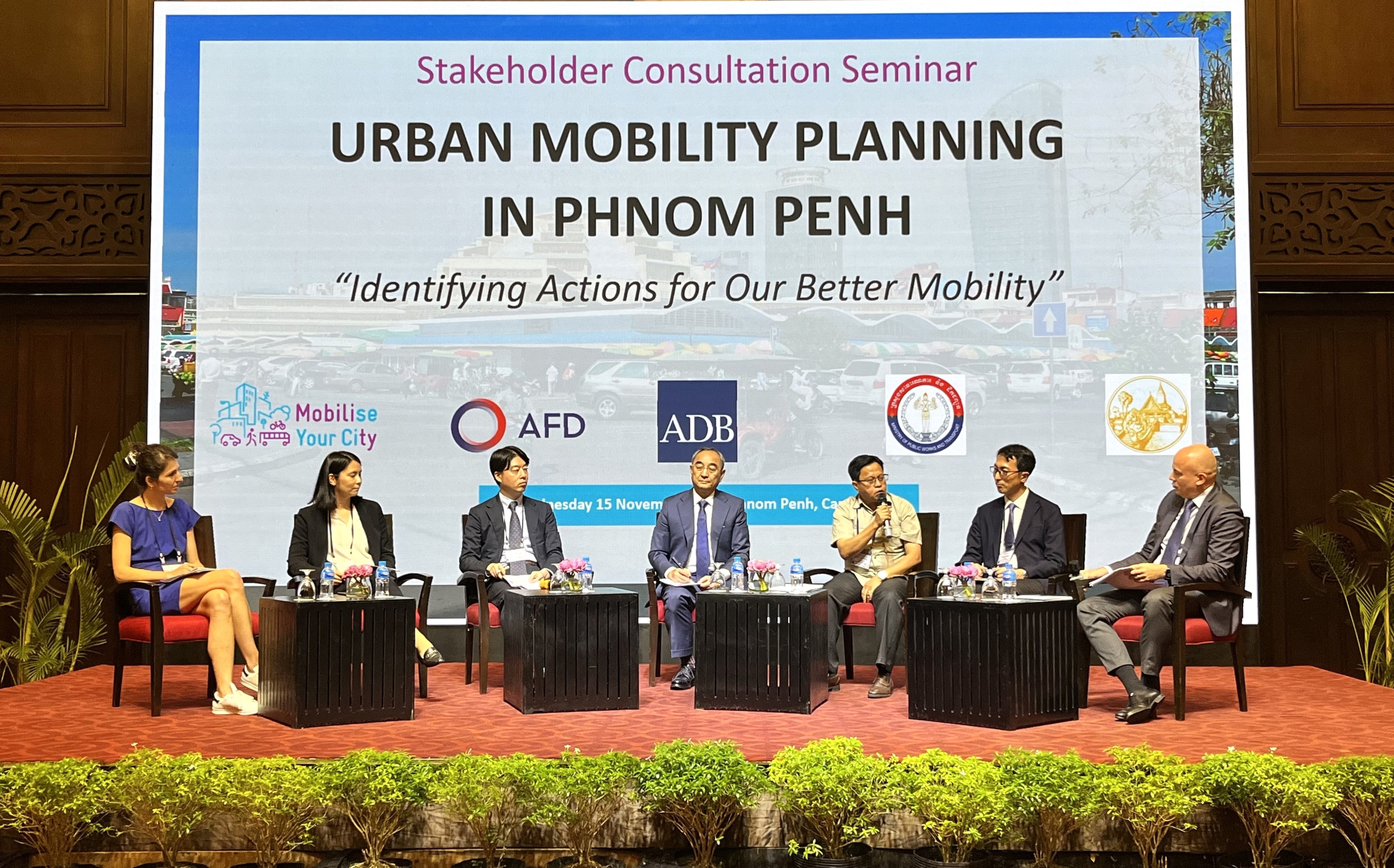 Panel discussion session 1 - Urban Transport Performance in Phnom Penh [From left to right: Ms. Anne-Laure Ullmann, Southeast Asia Transport Task Team Leader, AFD; Ms. Mariko Iwai, Project Formulation Advisor, JICA Cambodia Office; Mr. Manabu Owada, Deputy General Manager, Oriental Consultants Global Co., Ltd.; H.E. Trac Thai Sieng, Secretary of State of Ministry of Public Works and Transport; Mr. Prom Kampoul, Chief Officer, Depart of Public Works and Transport, Phnom Penh Capital Administration; Mr. Daisuke Mizusawa, Senior Transport Specialist, ADB;  Mr. Bertrand Goalou, Principal Transport Specialist, ADB]